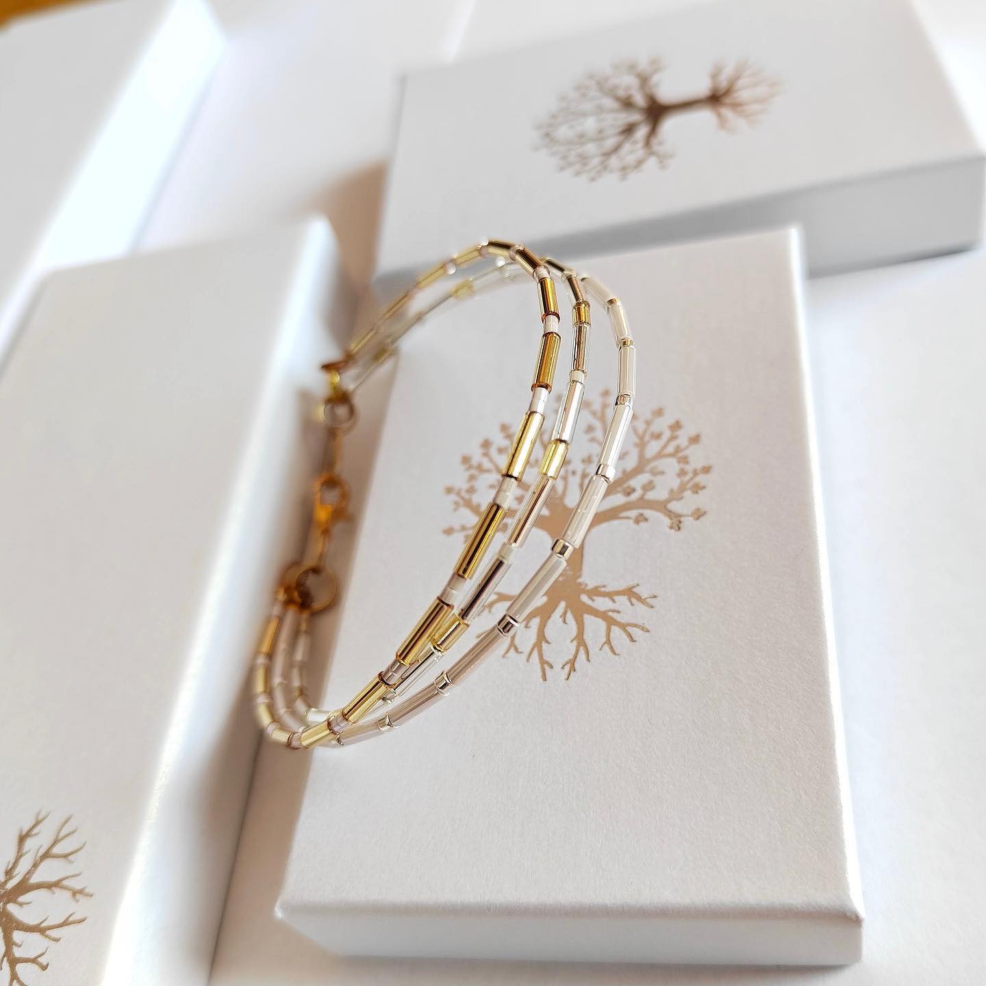 Náramek trojitý bílozlatostříbrný (č. 339)