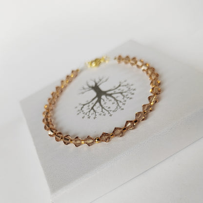 Zlatavý Swarovski (č. 728)